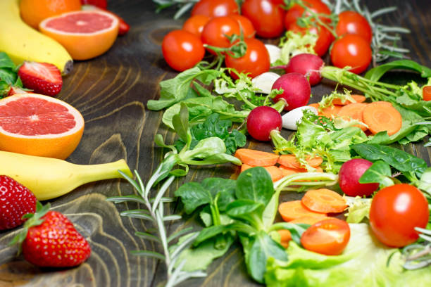 istock Healthy fresh vegetarian food, fresh organic fruit and vegetable on rustic table 1277179527