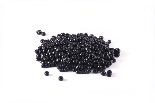 istock Beads spread on white background. Background or texture of beads. Close up, macro,It is used in finishing fashion clothes. make bead necklace or beads for woman of fashion,Bead Crochet. Daily Beading. 1277181257