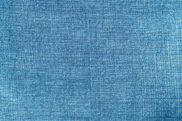 istock Blue color denim jeans clothes textured background 1277181894