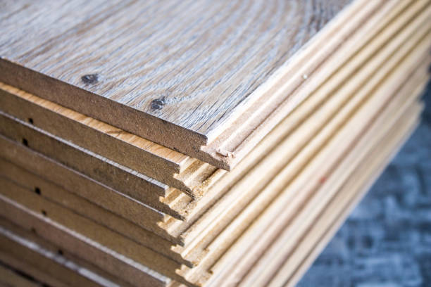 istock Laminate. Samples of laminate and floorboard. Cutting and laying flooring. 1277182011