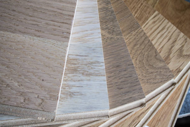 istock Laminate. Samples of laminate and floorboard. Cutting and laying flooring. 1277182035