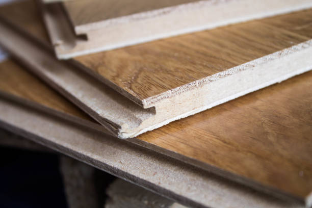 istock Laminate. Samples of laminate and floorboard. Cutting and laying flooring. 1277182063