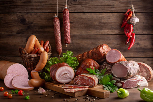 smoked and sausages smoked meats and sausages in assortment cold cuts meat photos stock pictures, royalty-free photos & images