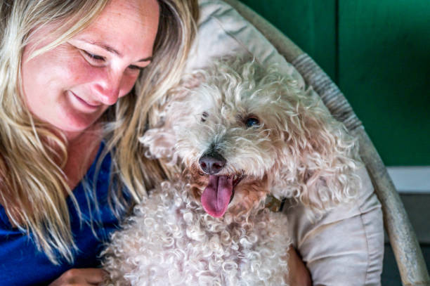 istock Woman spending time with her dog 1277182137