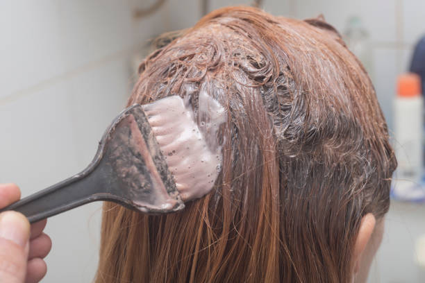 istock Dying long hair in orange color 1277184956