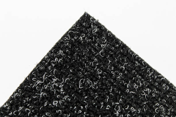 istock Carpet with rubber base on a white background. Cut a piece of carpet from a roll. 1277187713