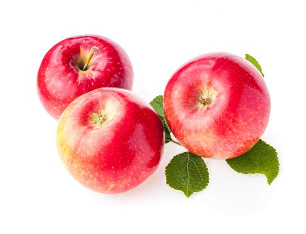istock ripe red apples with leaves isolate on white background 1277187996