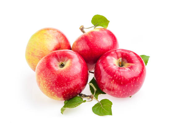 istock closeup red apples with green leaves isolate on white background 1277188025