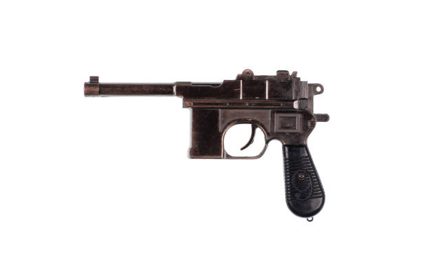 istock old bronze revolver isolated on white background 1277190232