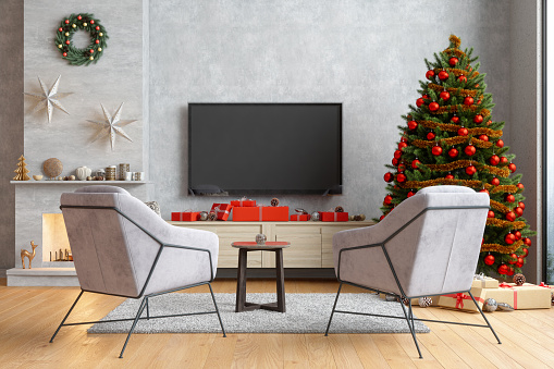 Smart Tv Mockup With Blank Screen In Modern Living Room With Armchairs, Christmas Tree And Gift Boxes