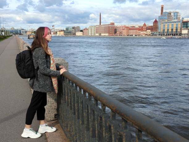 istock young girl with a backpack in the city 1277196984