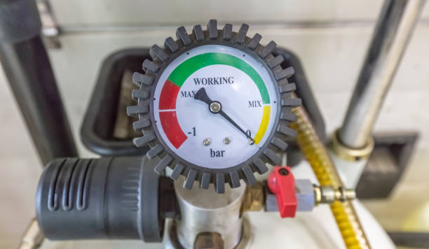 istock Pressure gauge Meter installed, Measuring Tool equipment close up 1277198325