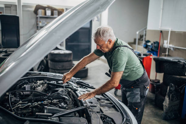 istock Mature man working in auto repair shop 1277198449