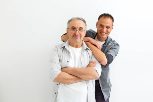 istock Senior Father With Adult Son on a white background 1277199857