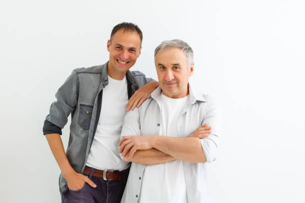 istock Senior Father With Adult Son on a white background 1277199901