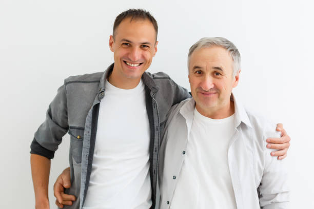 istock Senior Father With Adult Son on a white background 1277199998