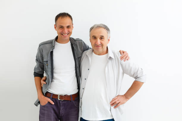 istock Senior Father With Adult Son on a white background 1277200086