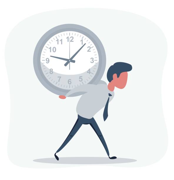 istock portrait of a handsome young man carrying a clock against a grey 1277203240