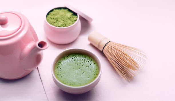 Organic Green Matcha Tea Fresh organic matcha tea powder and drink with bowl and Chasen bamboo whisk. matcha tea photos stock pictures, royalty-free photos & images