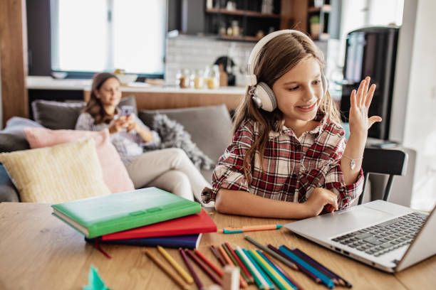 istock Young girl is learning online at home 1277204555