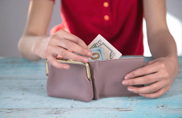istock woman hand money and wallet 1277205767