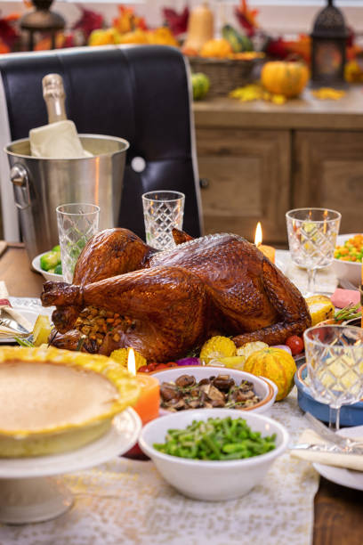 istock Traditional Stuffed Turkey Dinner with Side Dishes for Thanksgiving Celebration 1277207536