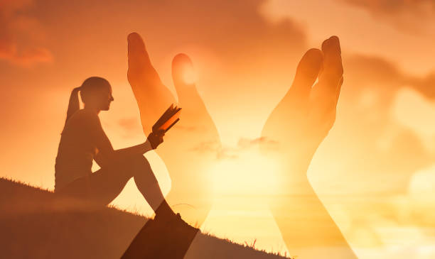 istock Young woman reading a Bible 1277214830