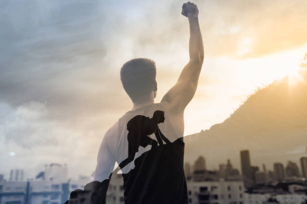 istock Young man in the city reaching his goals. 1277214868