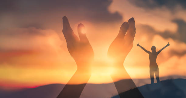 istock Woman on a mountain top feeling positive and energized 1277215670
