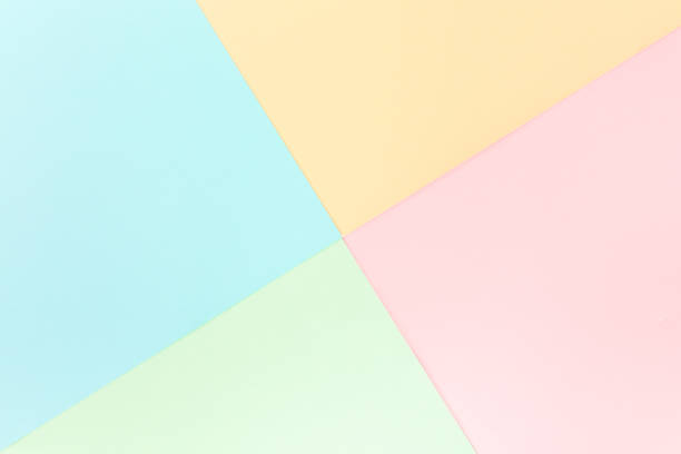 istock Background pastel colors: pink, yellow, blue, green. Geometric pattern papers. Minimal concept. Flat lay, Top view 1277216227