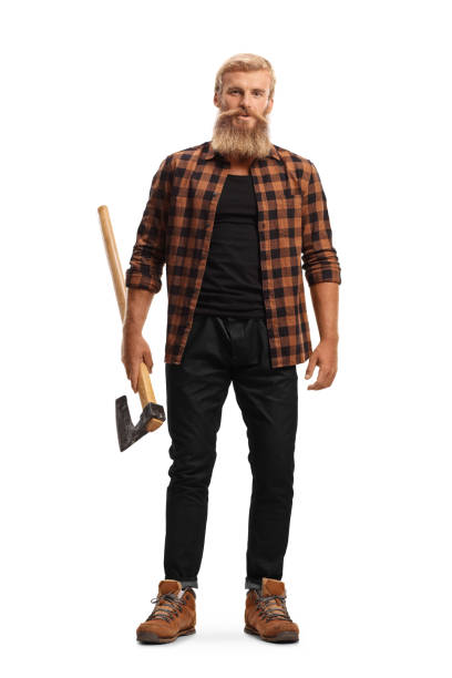 Full length portrait of a bearded guy holding a hatchet Full length portrait of a bearded guy holding a hatchet isolated on white background lumberjack stock pictures, royalty-free photos & images