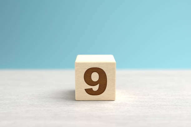 istock A wooden toy cube with the number 9. 1277218139