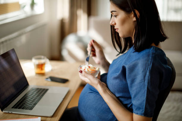 istock Pregnant woman at home 1277221809