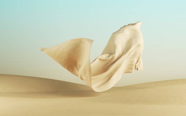 istock 3d render, abstract modern minimal background with flying drapery on a desert landscape with sand dunes, textile cloth falls down 1277222596