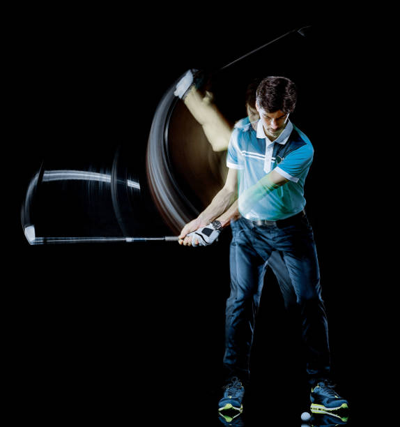 istock Golfer man golfing golf swing isolated black background multiple exposure 1277223688