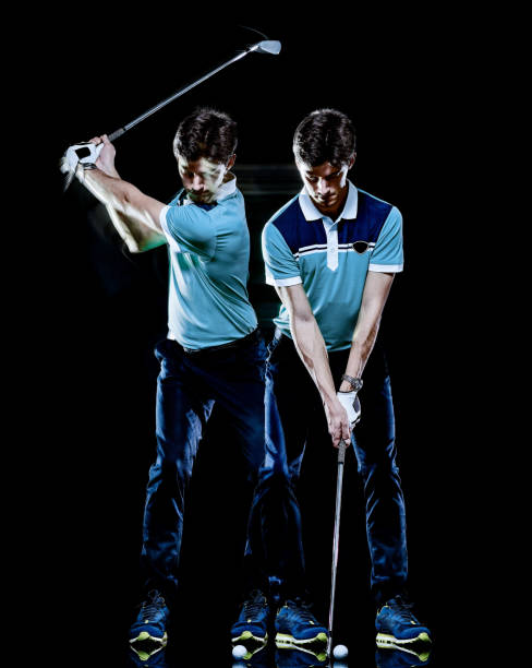 istock Golfer man golfing golf swing isolated black background multiple exposure 1277223694