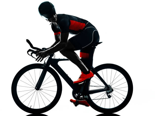 istock triathlete triathlon Cyclist cycling silhouette isolated white background 1277223707