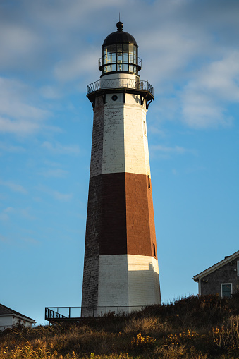 Iconic Pemaquid Point lighthouse park at sunset, Maine, USA