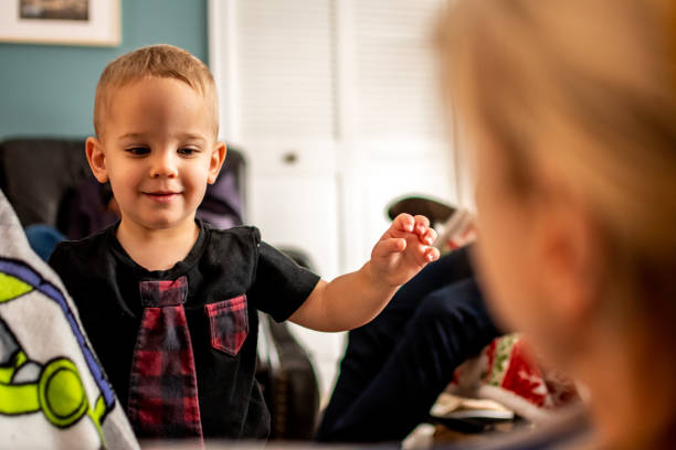 istock Toddler having fun with his grandmother. 1277227307