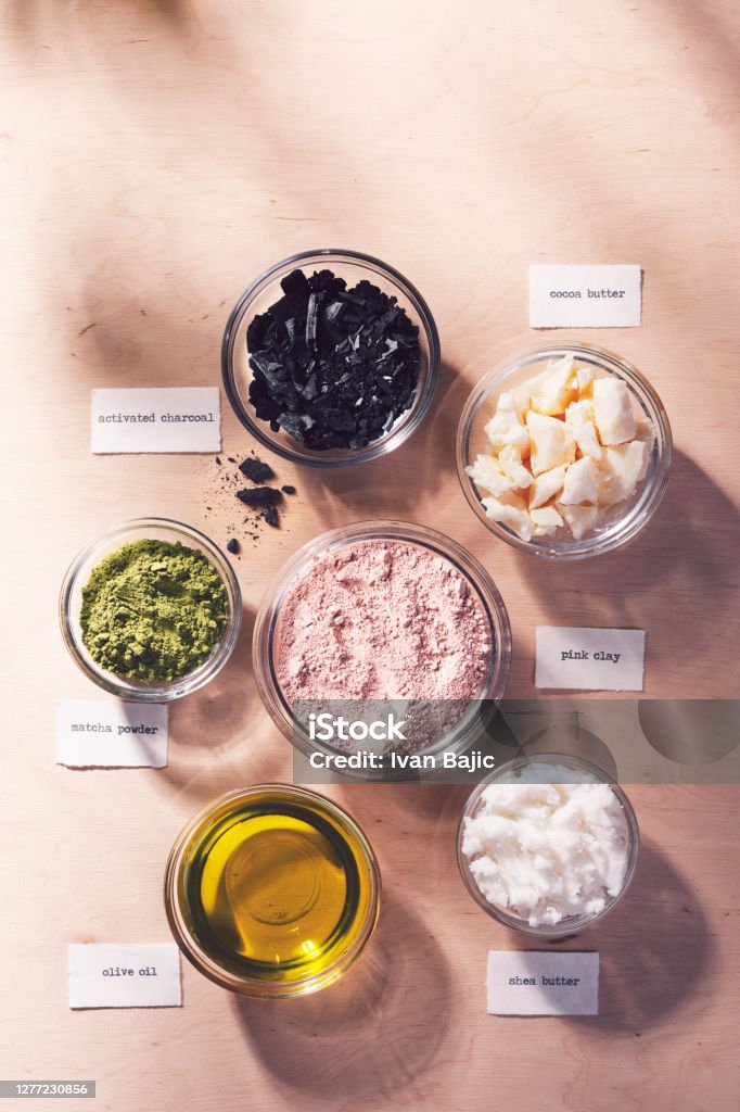 Natural Cosmetics Ingredients Eco friendly natural homemade skincare ingredients with name labels. Ingredient Stock Photo