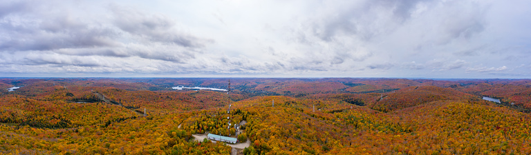 Aerial Panoramic View of Laurentian's Landscape and Communication Tower in Autumn at Sunset, Quebec, Canada