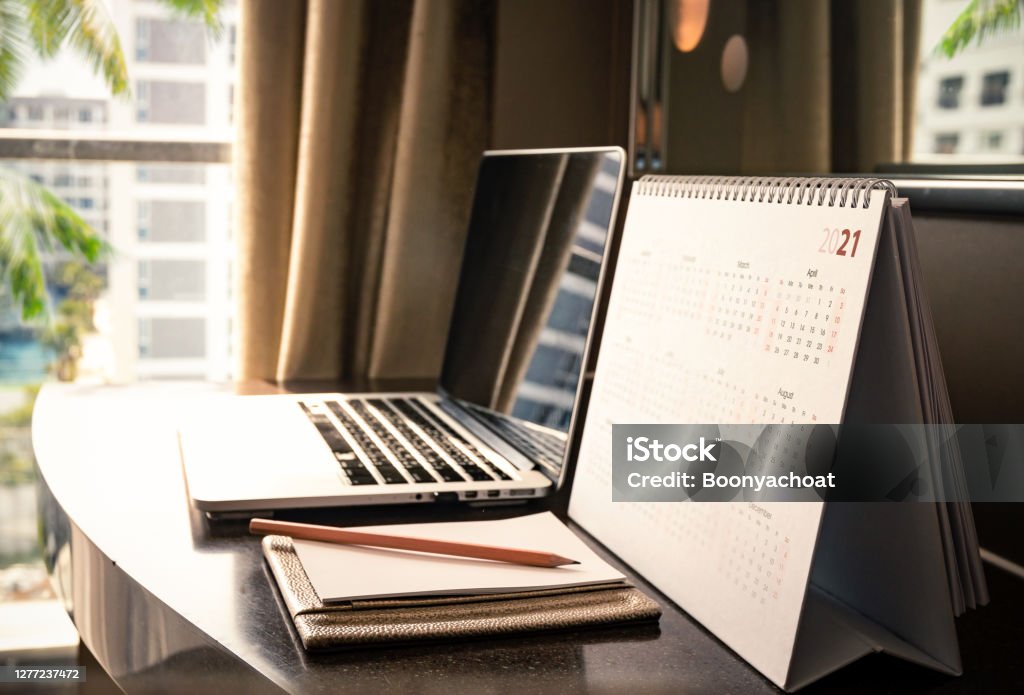 Calendar 2021 Calendar 2021 schedule with blank note for to do list on wooden desk Calendar Stock Photo