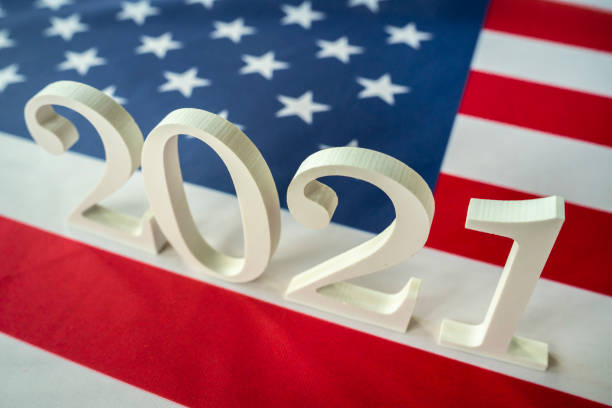 istock American flag and 2021 1277238599