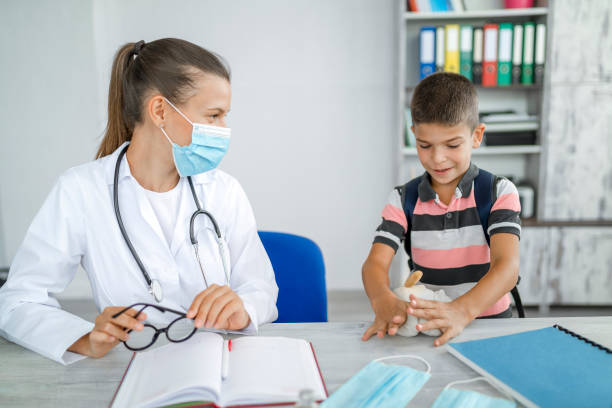 istock Pediatrician checking cute little boy 1277238817