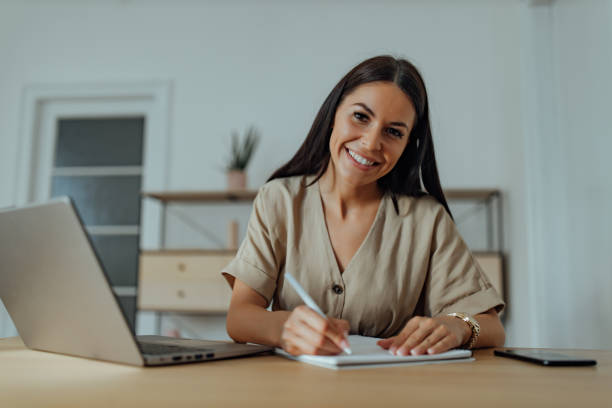istock Business woman in her home office. 1277242802