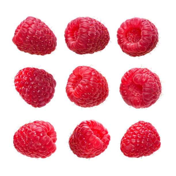 istock Large set of fresh ripe raspberry isolated on a white background. Macro shot. Berries from different angles. 1277244135