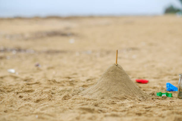 istock Sand pile on the beach, Playing in the sand 1277245054