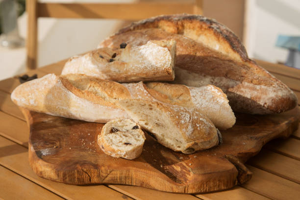 istock serving bread for Breakfast, sliced baguette with olives 1277246497