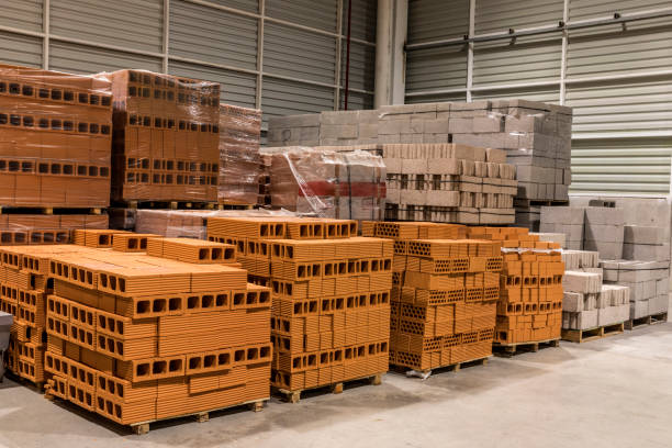 istock Perspective of Warehouse with materials for construction. 1277247118
