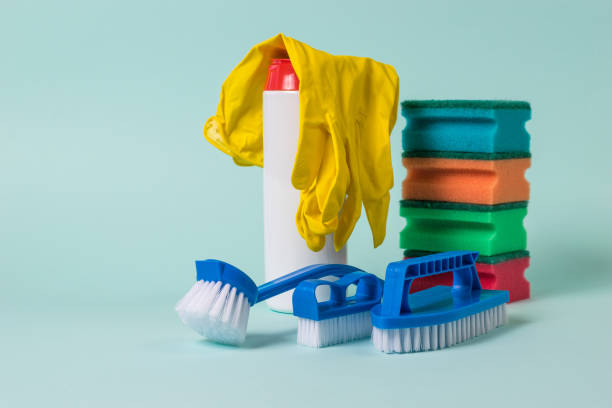 istock A set of brushes and cleaning products on a blue background. 1277254625
